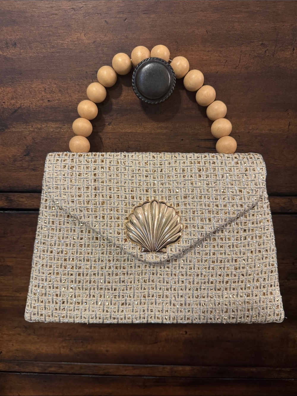Tommy Bahama woven clutch with shell clasp